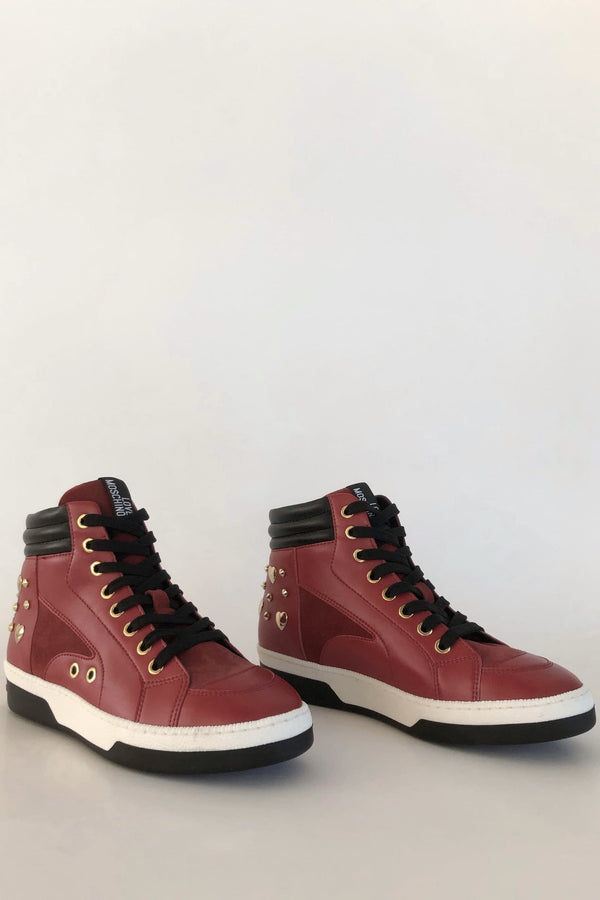 Love Moschino Sneaker borchiata vista laterale di entrambe le scarpe
